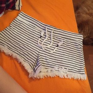 White shorts with black lines.